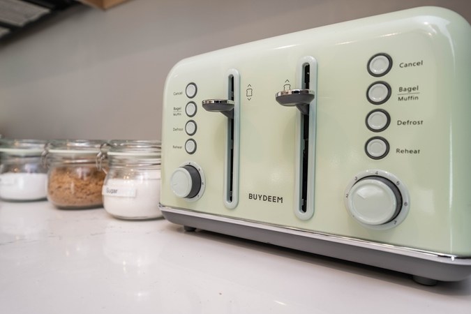 Toaster and glass canisters on the kitchen counter